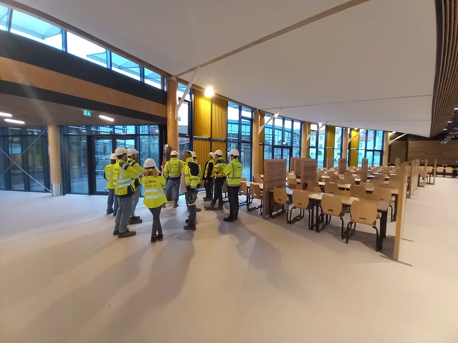 Équipe CREALI en visite dans un bâtiment achevé